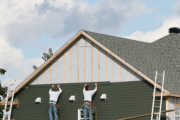 Professional Siding Installation technician working in Commercial Point, OH